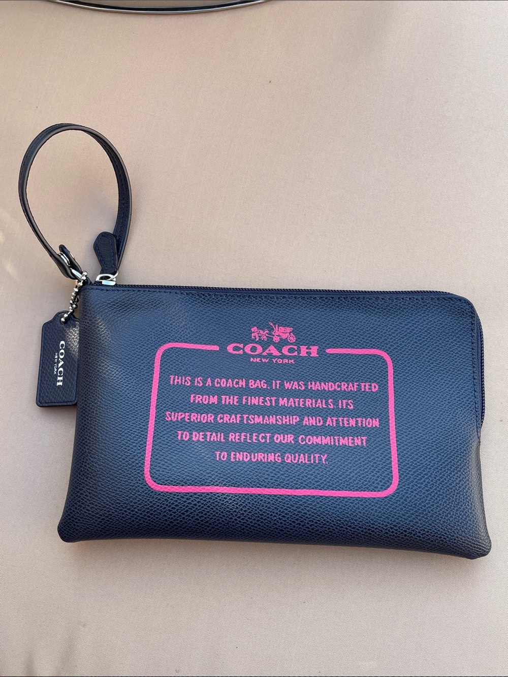 Coach Black Leather Wristlet with Pink Logo Patch